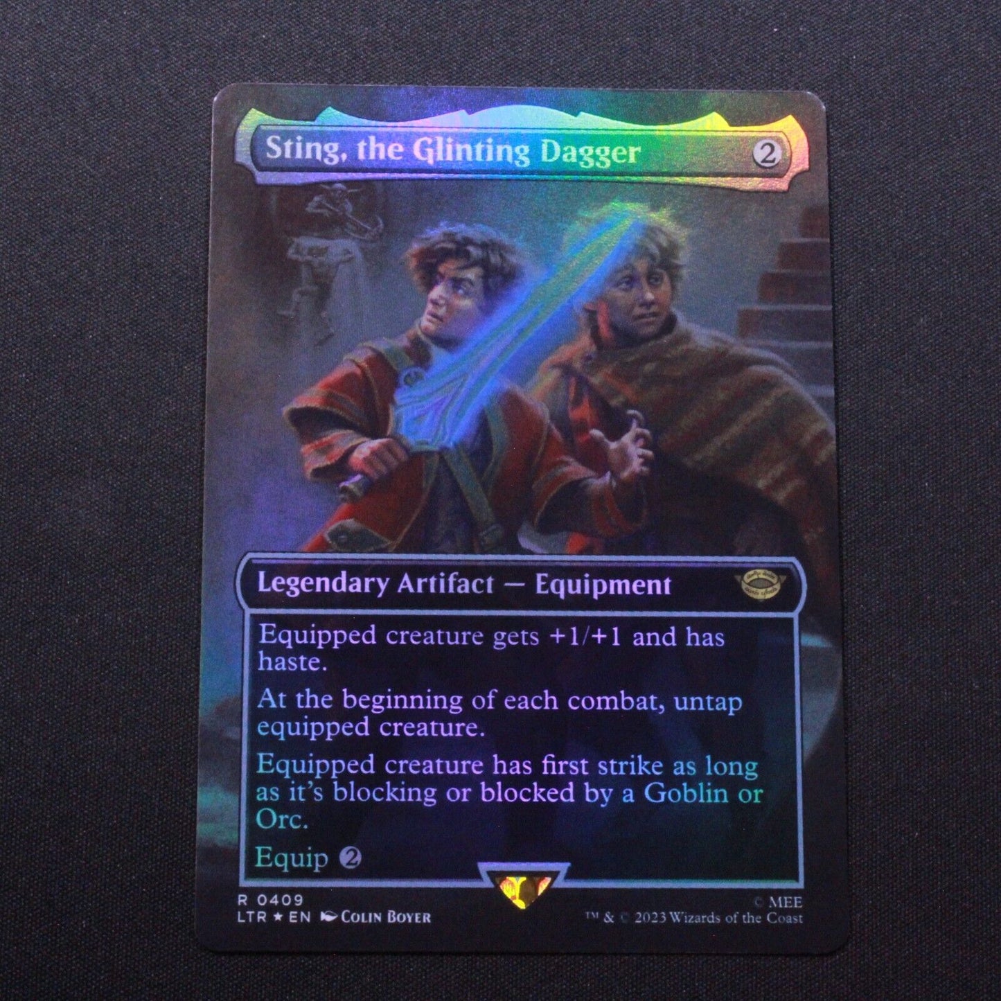 MTG The Lord of the Rings LTR FOIL Sting, the Glinting Dagger Borderless 409 NM