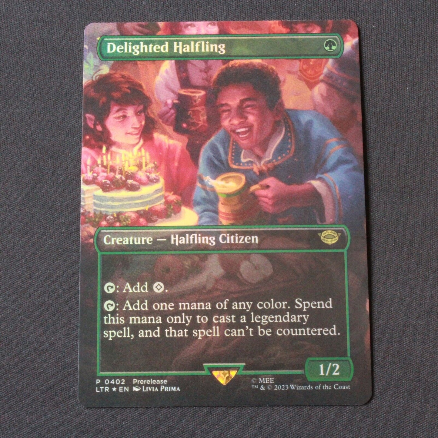 MTG The Lord of the Rings (LTR) Rare FOIL Delighted Halfling (Borderless) 402 NM