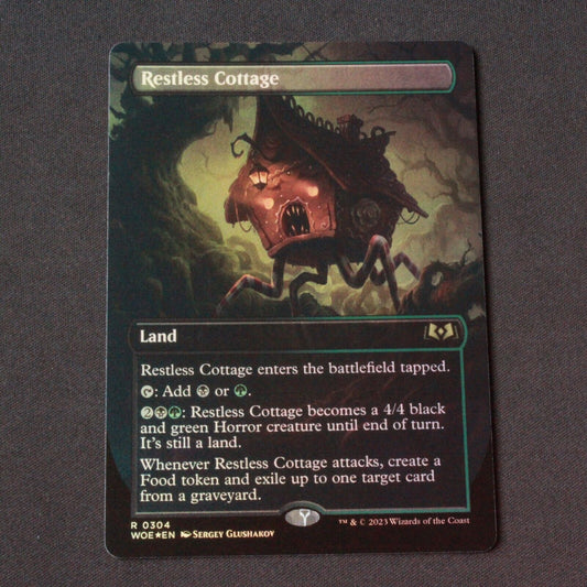 MTG Wilds of Eldraine (WOE) Rare FOIL Restless Cottage (Borderless) 304 NM