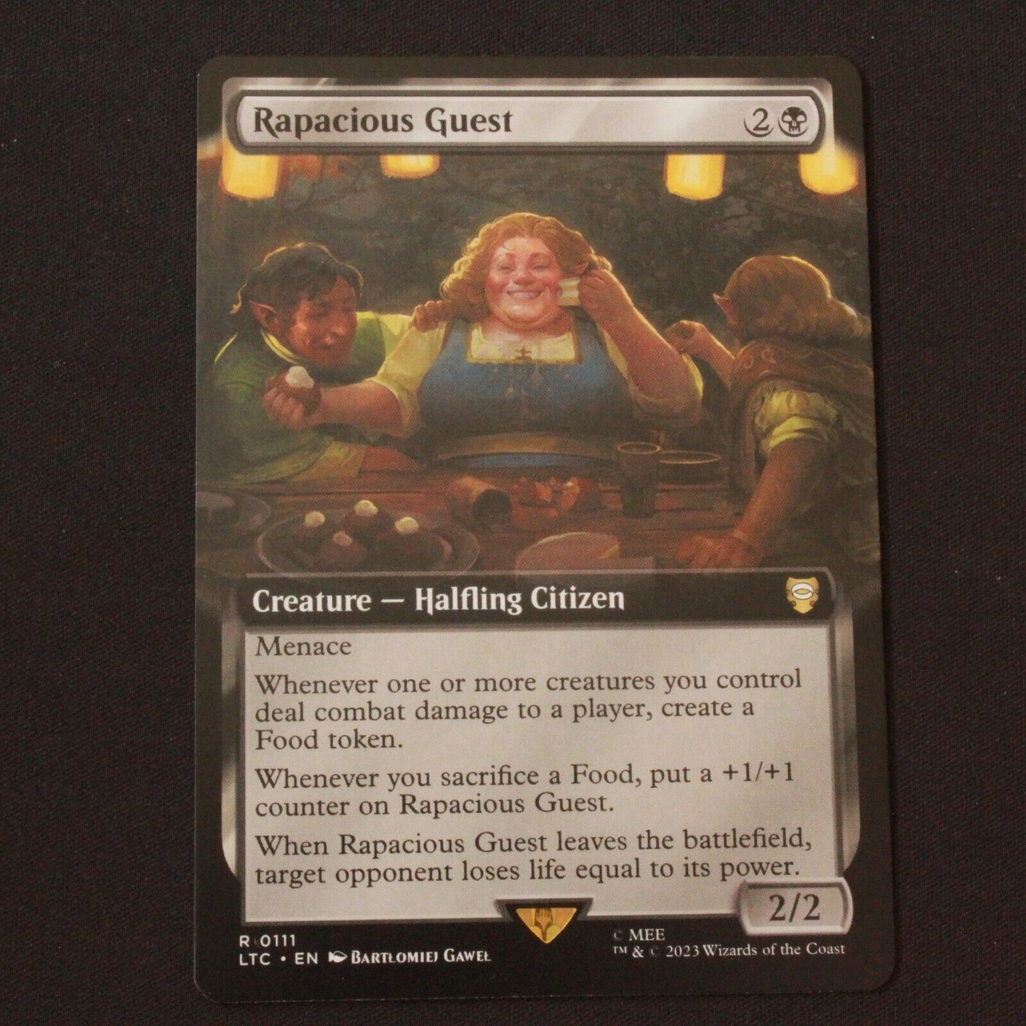 MTG Commander Lord of the Rings: (LTC) Rare Rapacious Guest Extended Art 111 NM