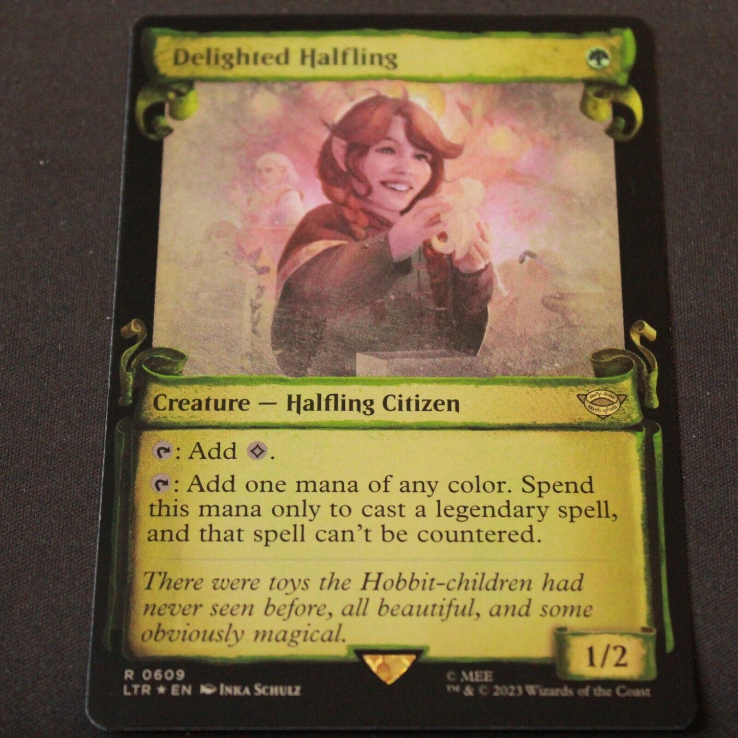 MTG Lord of the Rings LTR Rare FOIL Delighted Halfling (Showcase Scrolls) 609 NM