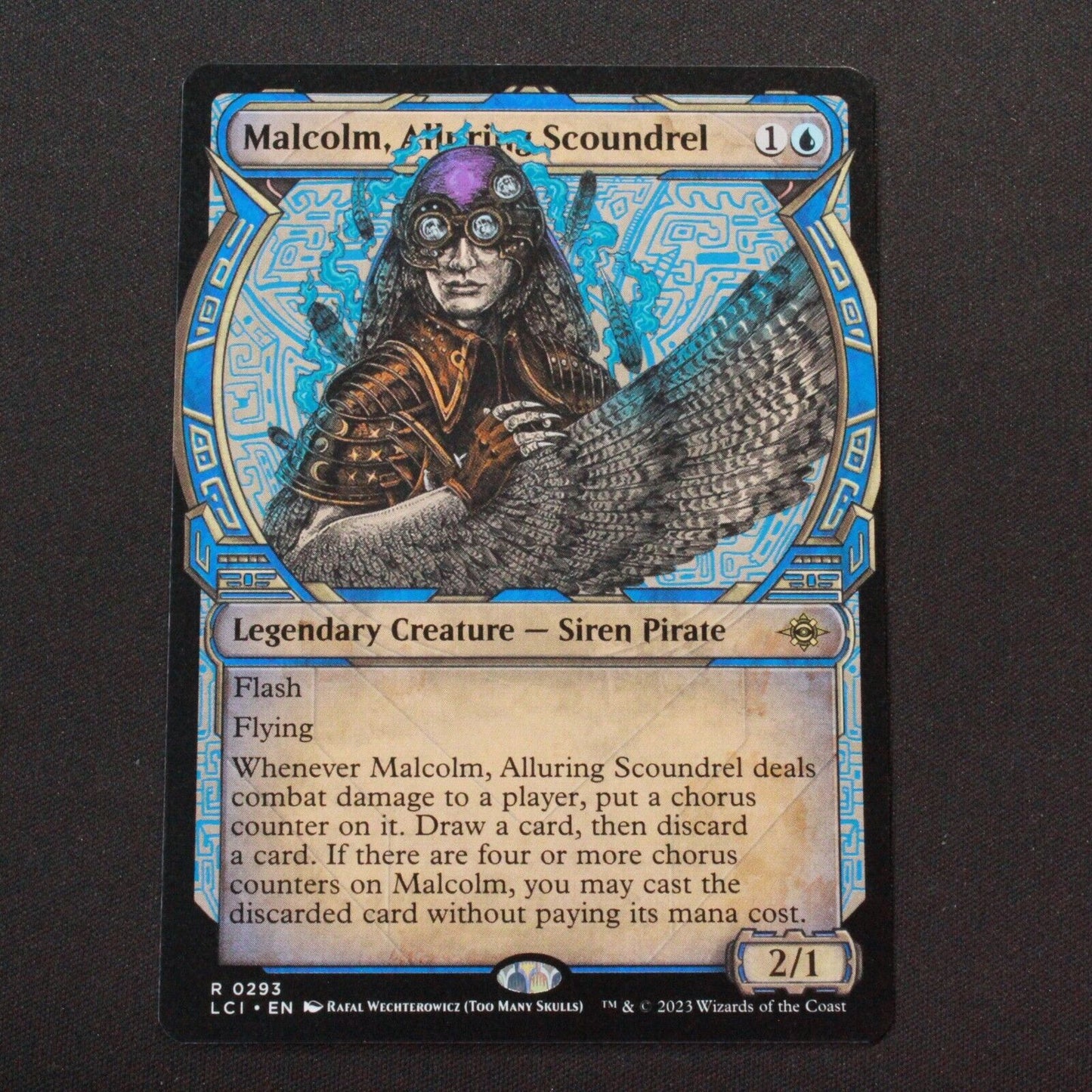 MTG The Lost Caverns of Ixalan LCI Malcolm Alluring Scoundrel Showcase 293 NM