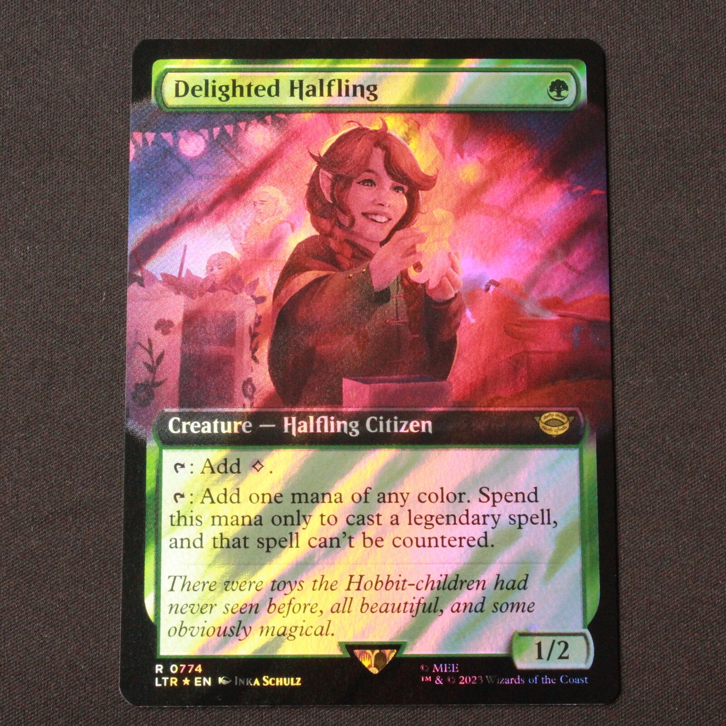 MTG Lord of the Rings LTR FOIL Delighted Halfling Extended Art Surge Foil 774 NM