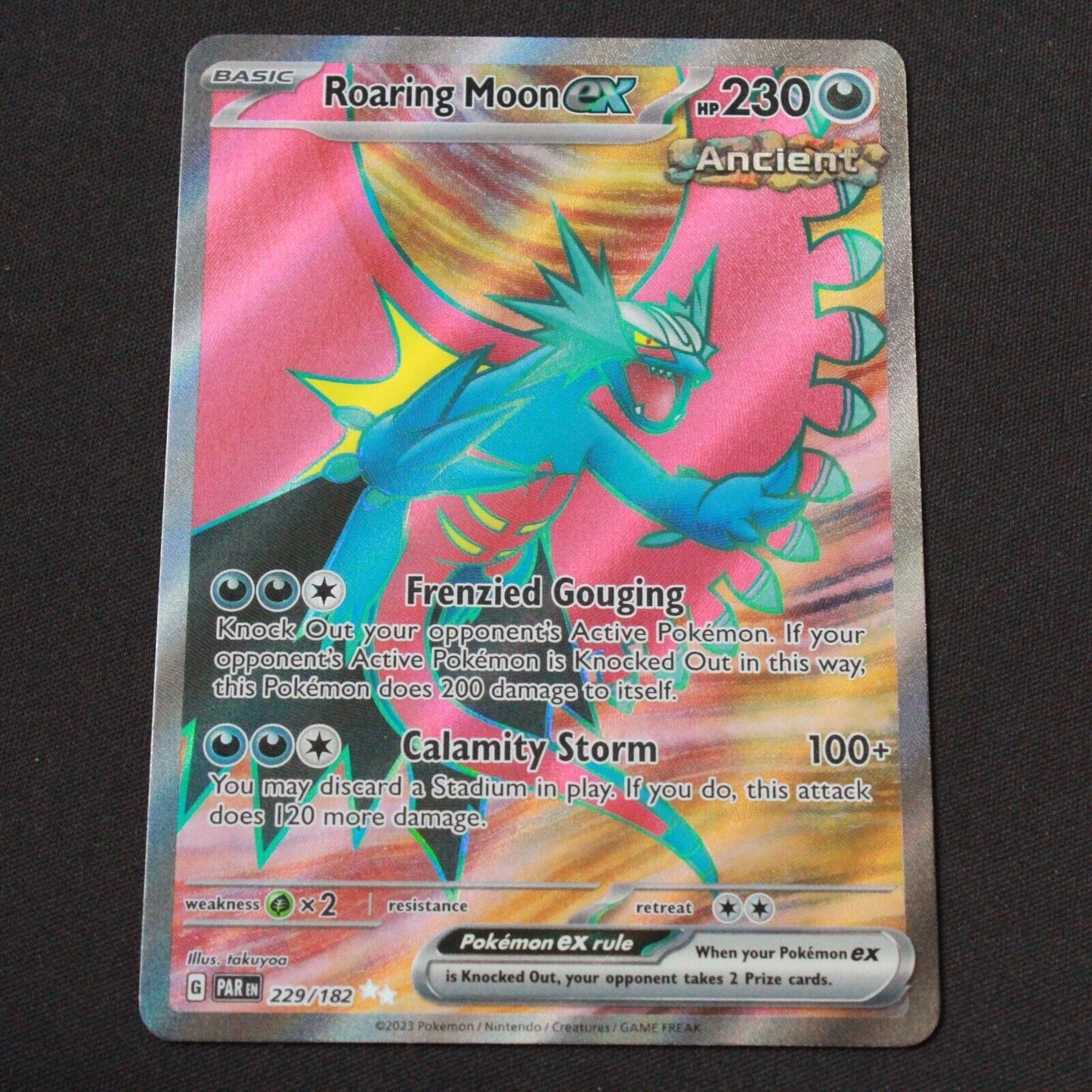 Pokemon SV04: Paradox Rift Ultra Rare Holofoil Roaring Moon ex 229/182 NM