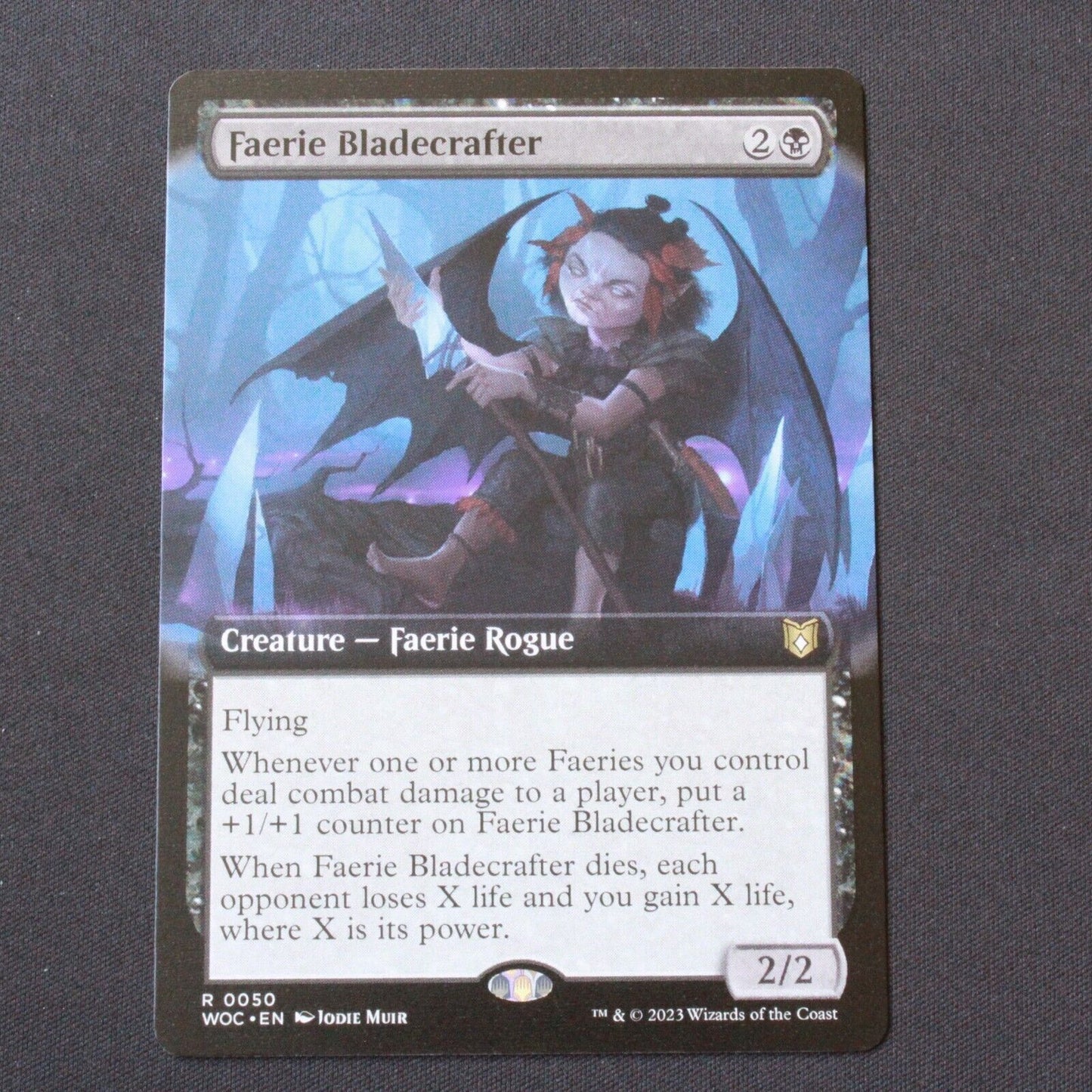 MTG Commander: Wilds of Eldraine WOC Rare Faerie Bladecrafter Extended Art 50 NM